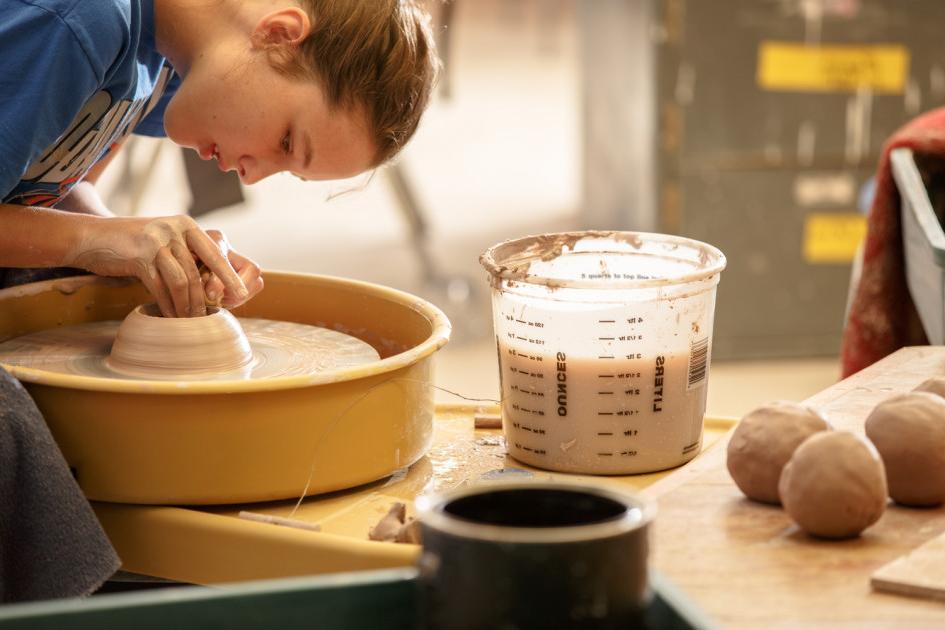 Student in a pottery class.